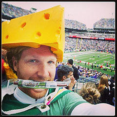 http://upload.wikimedia.org/wikipedia/commons/thumb/c/c4/Cheeseheads_in_Stadium_%2814819823518%29.jpg/240px-Cheeseheads_in_Stadium_%2814819823518%29.jpg