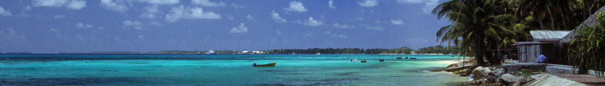 A beach at Funafuti atoll, Tuvalu, on a sunny day